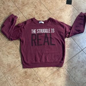Maroon pull over sweatshirt